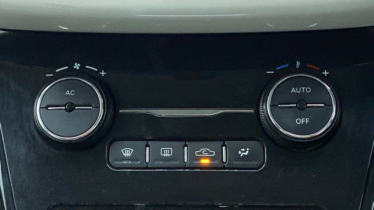 Climate control panel of a Tata Nexon 2017-2023