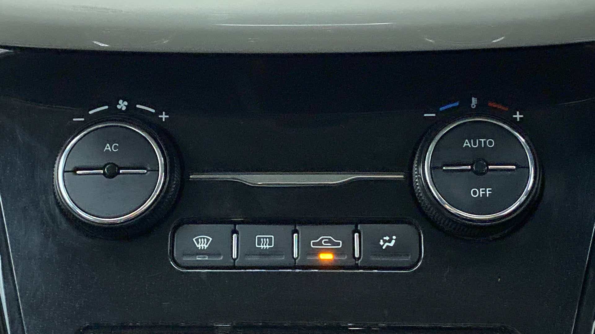 Climate control panel of a Tata Nexon 2017-2023