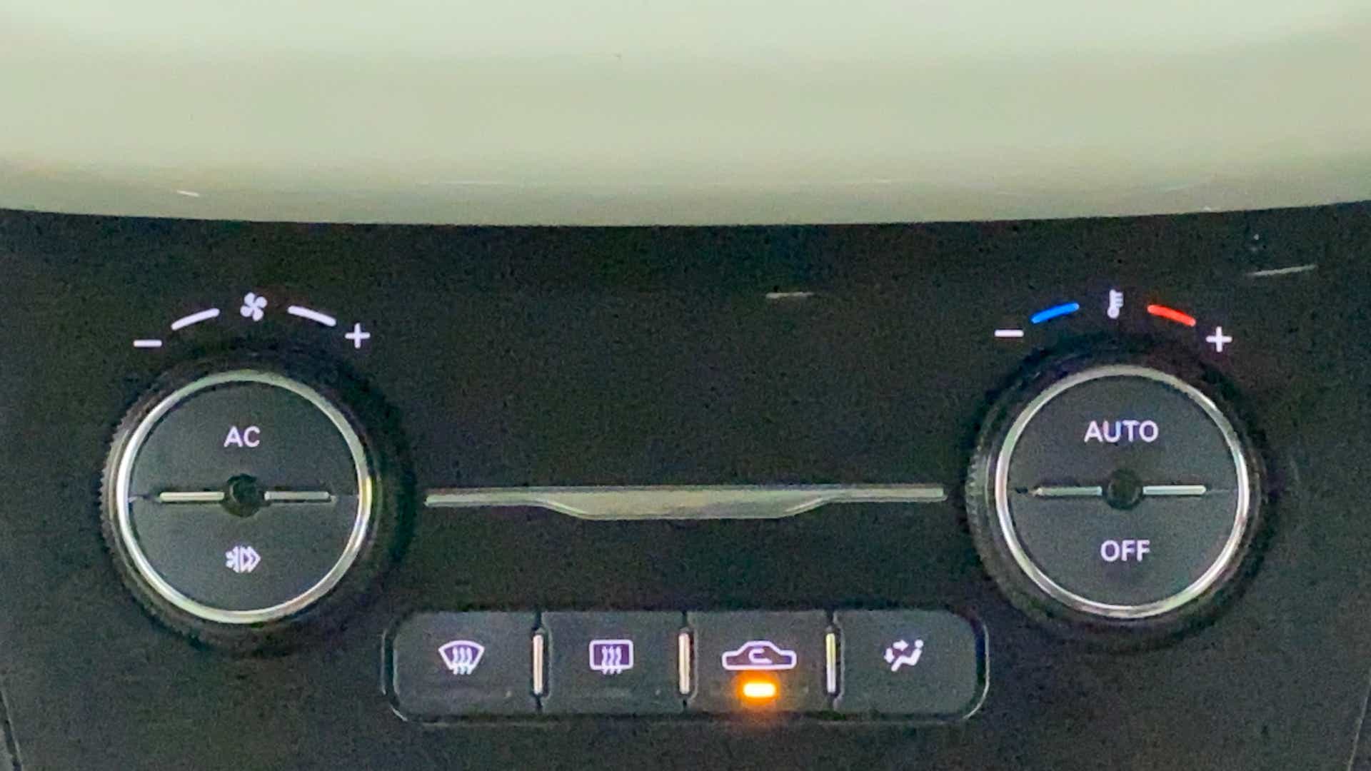 Climate control panel of a Tata Nexon 2017-2023
