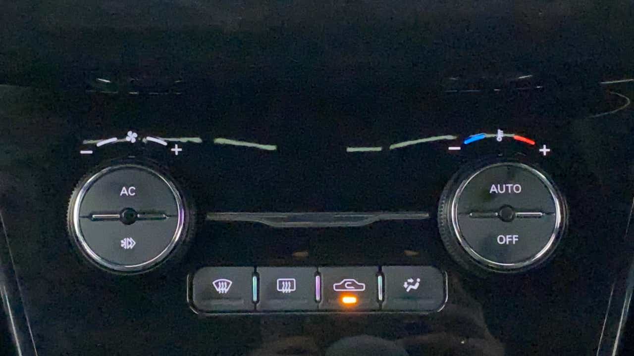 Climate control panel of a Tata Nexon 2017-2023