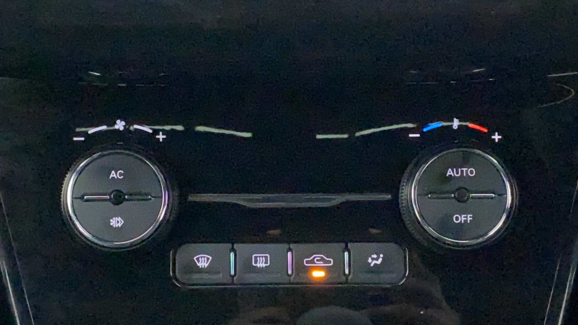 Climate control panel of a Tata Nexon 2017-2023