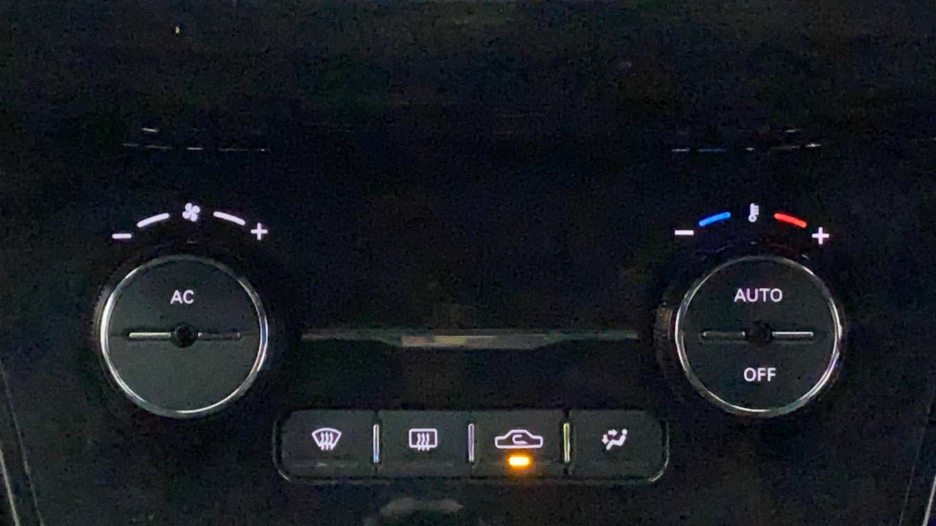Climate control panel of a Tata Nexon 2017-2023