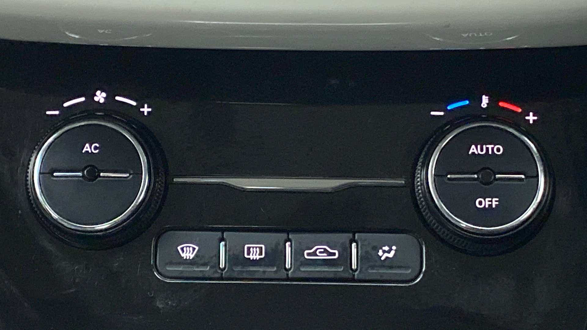 Climate control knobs of a Tata Nexon 2017-2023