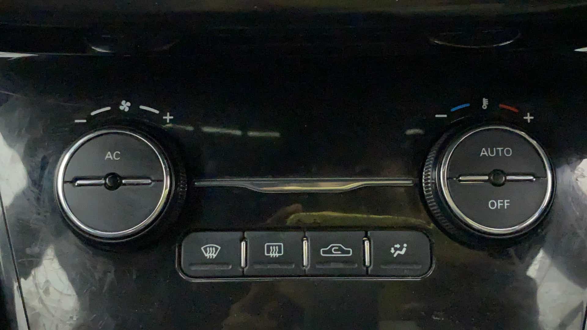 Climate control panel of a Tata Nexon 2017-2023