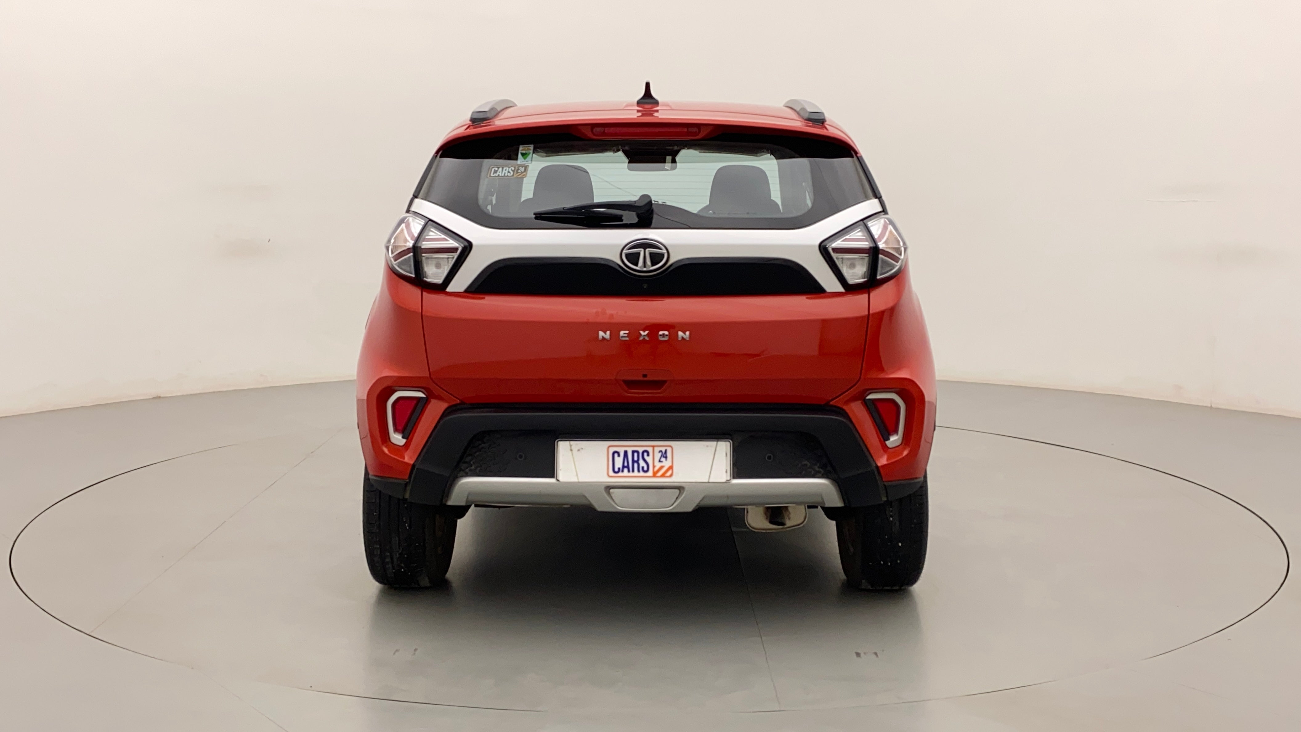 Rear view of a Flame Red Tata Nexon 2017-2023