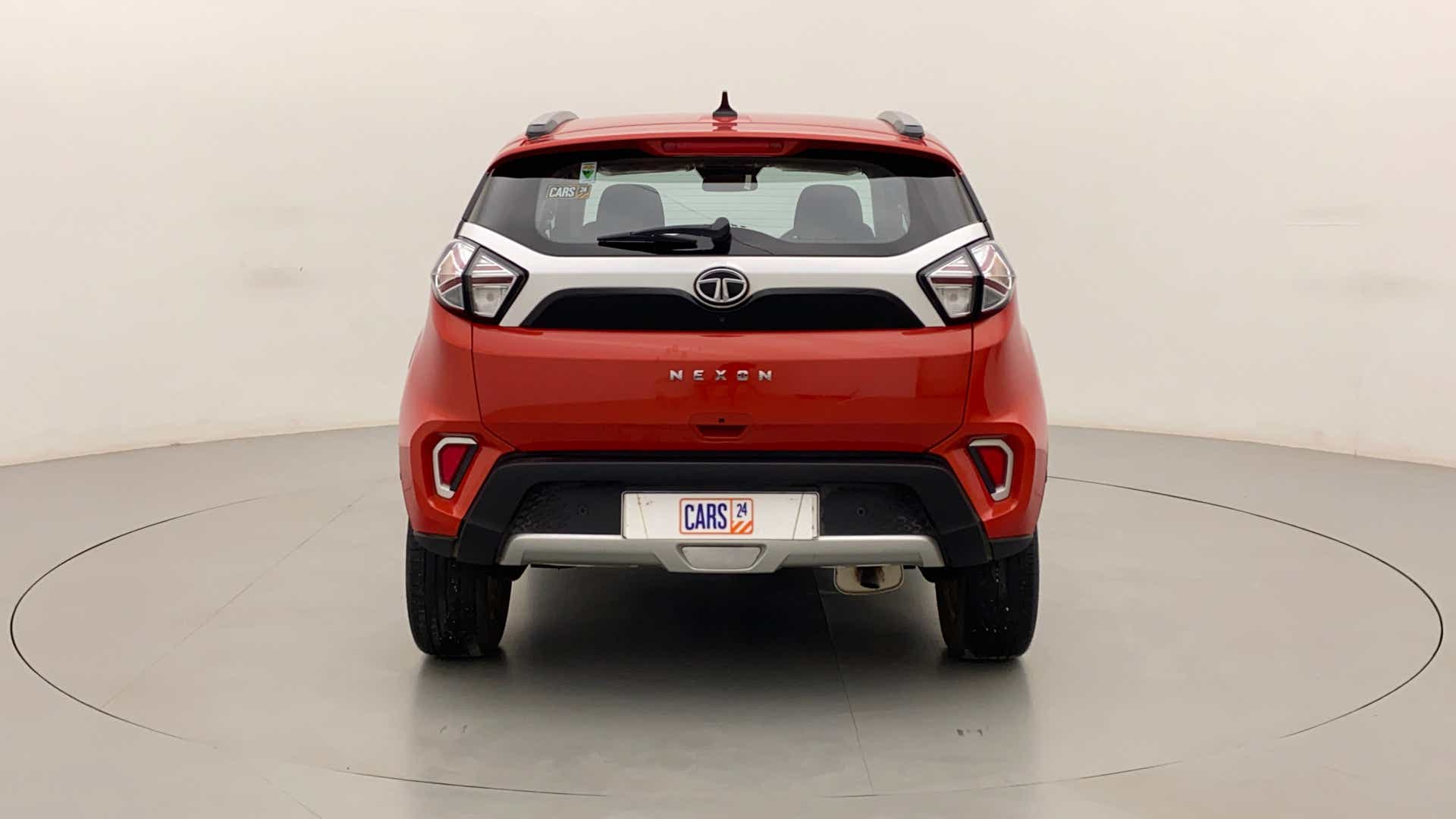Rear view of a Flame Red Tata Nexon 2017-2023