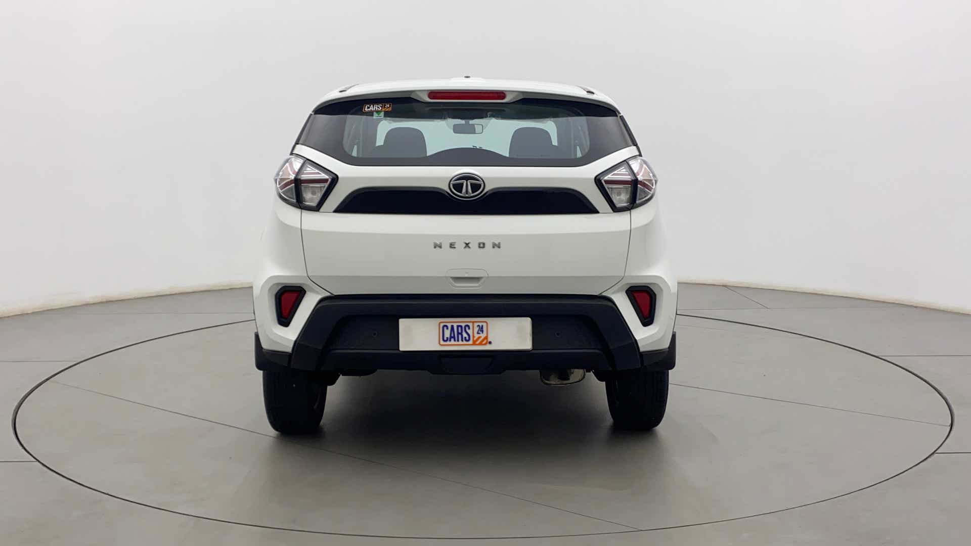 Rear view of a calgary-white Tata Nexon 2017-2023
