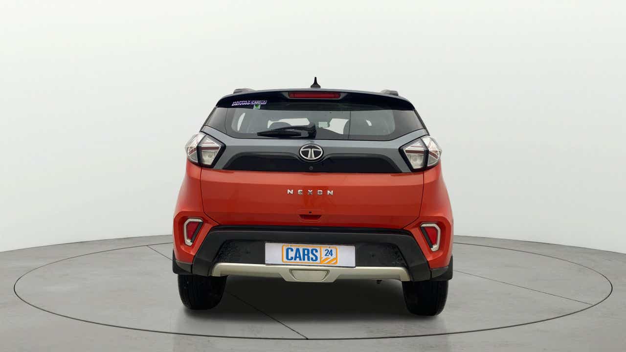 Rear view of a flame red Tata Nexon 2017-2023