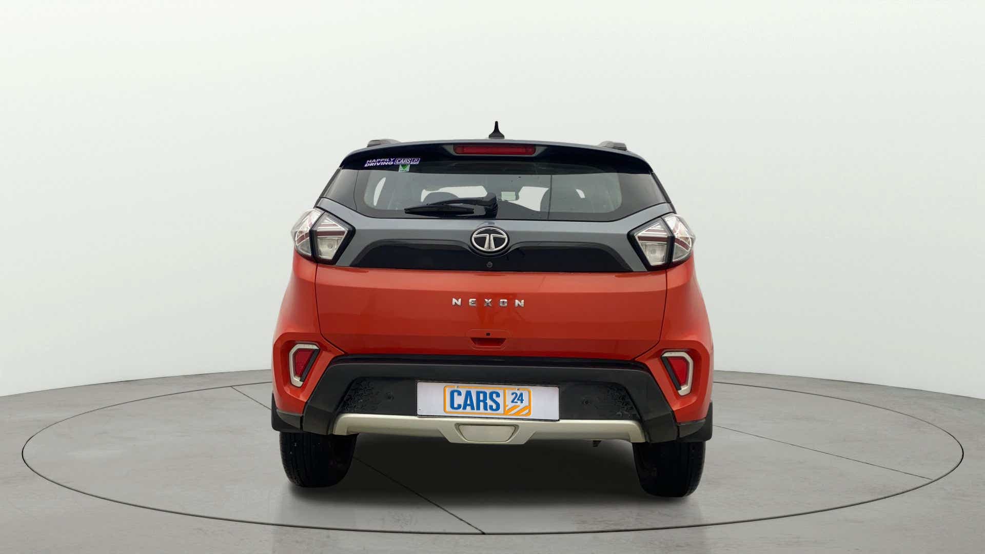 Rear view of a flame red Tata Nexon 2017-2023