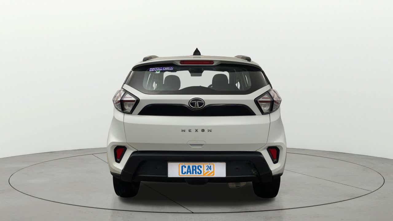 Rear view of a calgary-white Tata Nexon 2017-2023