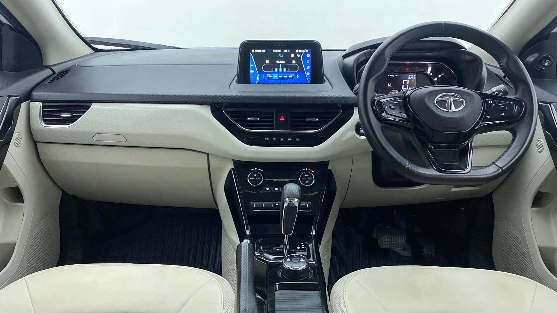 Dashboard and steering wheel view of a Tata Nexon 2017-2023