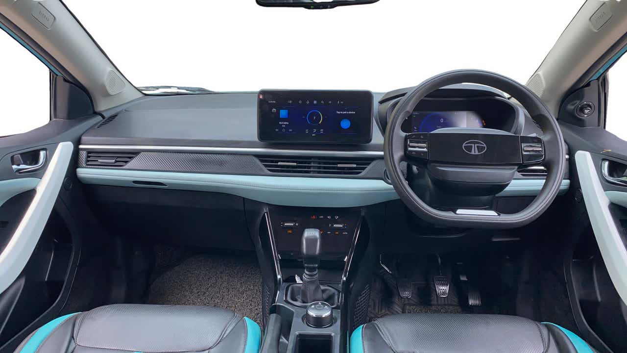 Dashboard and steering wheel of a Tata Nexon