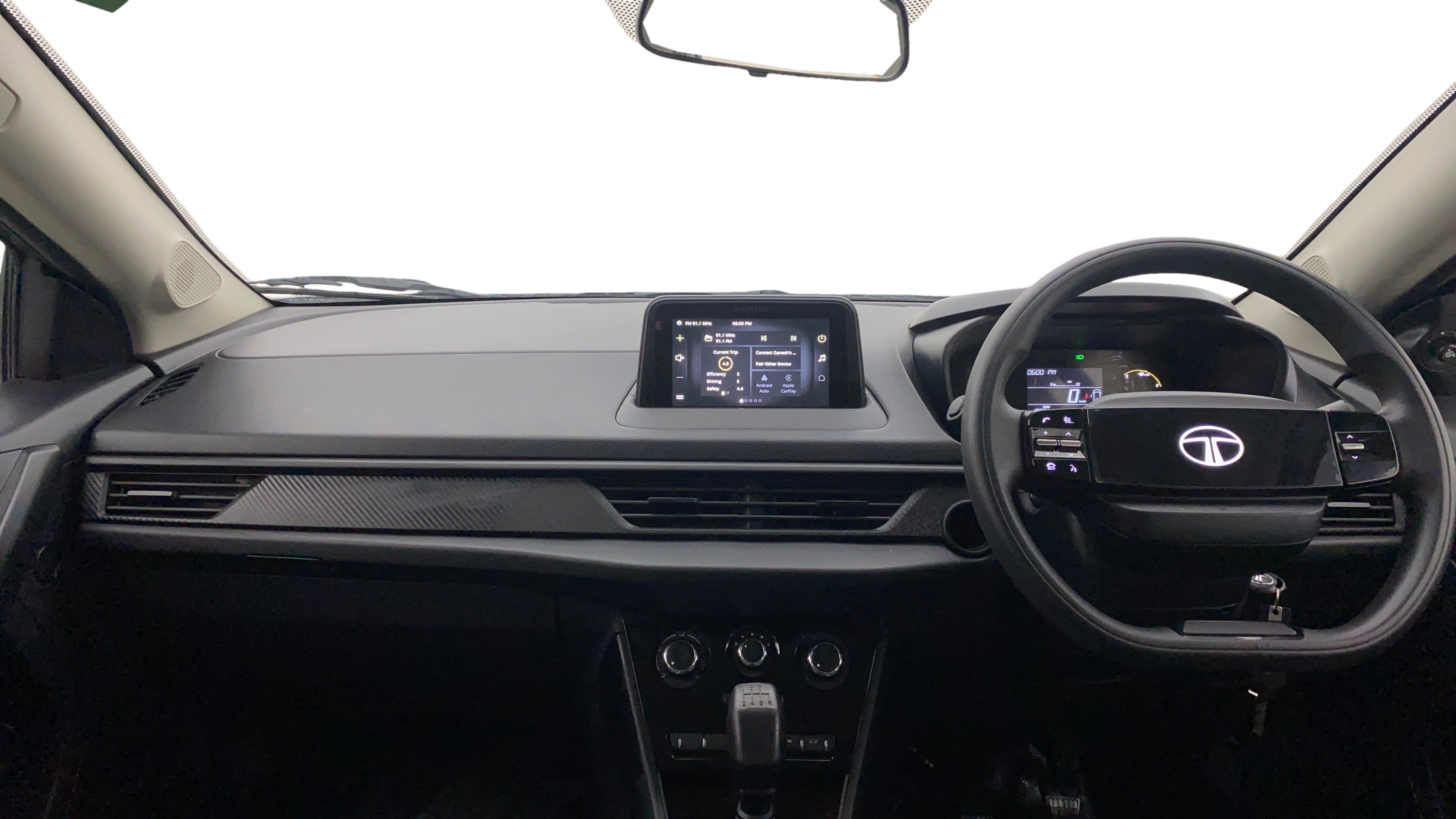 Dashboard and steering wheel view of a Tata Nexon
