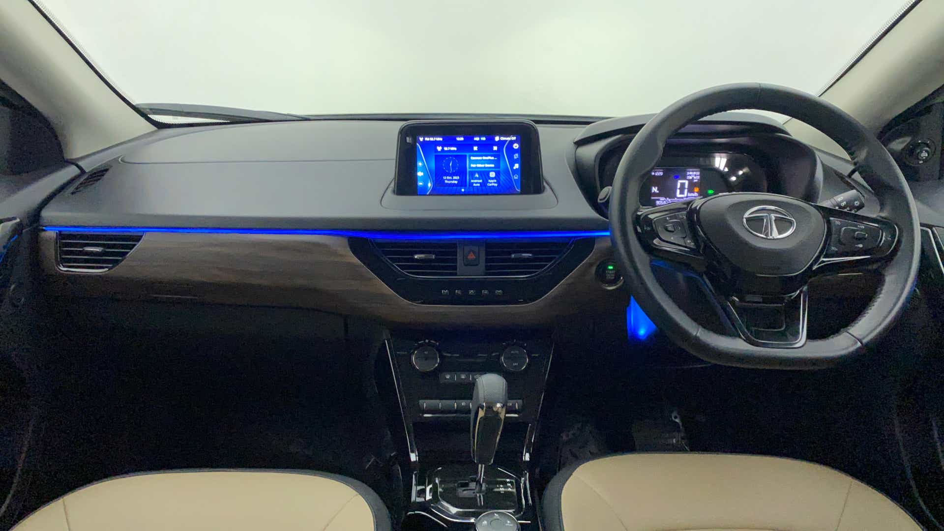 Dashboard and steering wheel view of a Tata Nexon 2017-2023