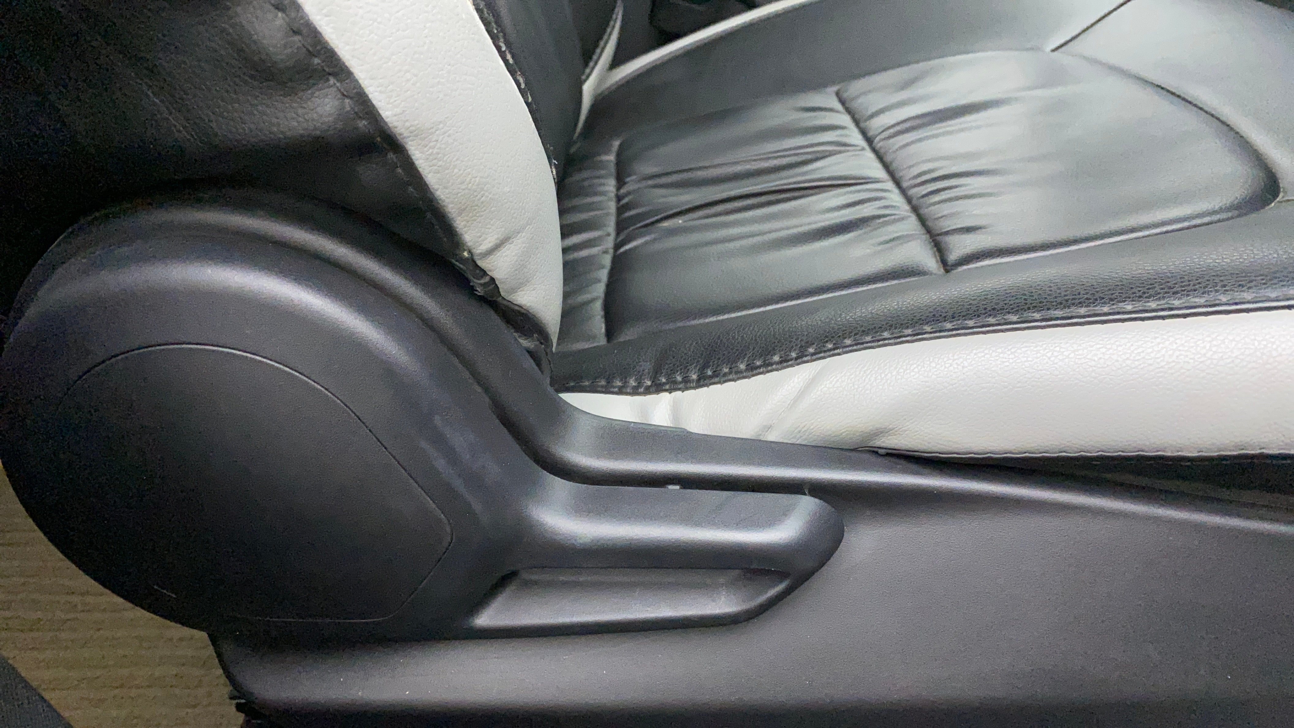 Seat adjustment lever and lower seat section of a Tata Nexon 2017-2023