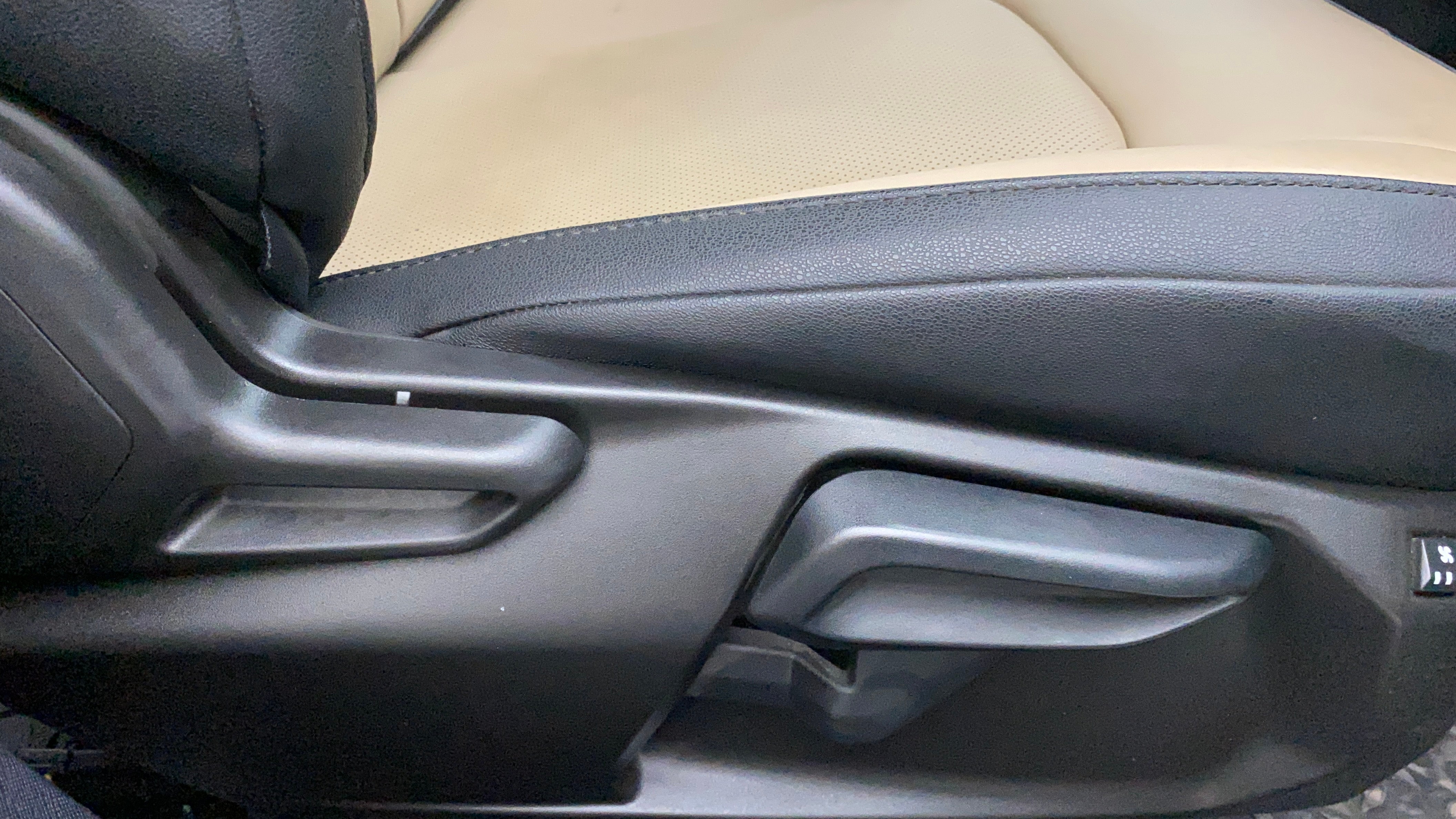 Seat adjustment lever of a Tata Nexon 2017-2023