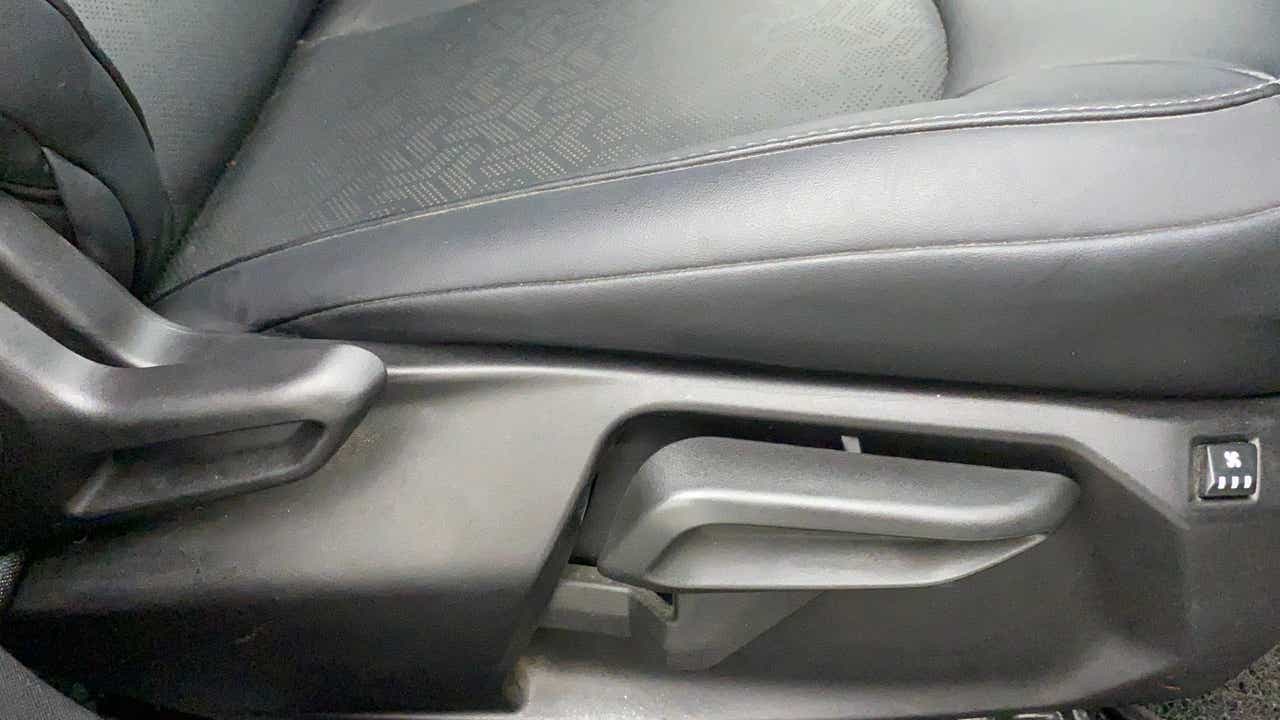 Seat adjustment lever area of a Tata Nexon 2017-2023