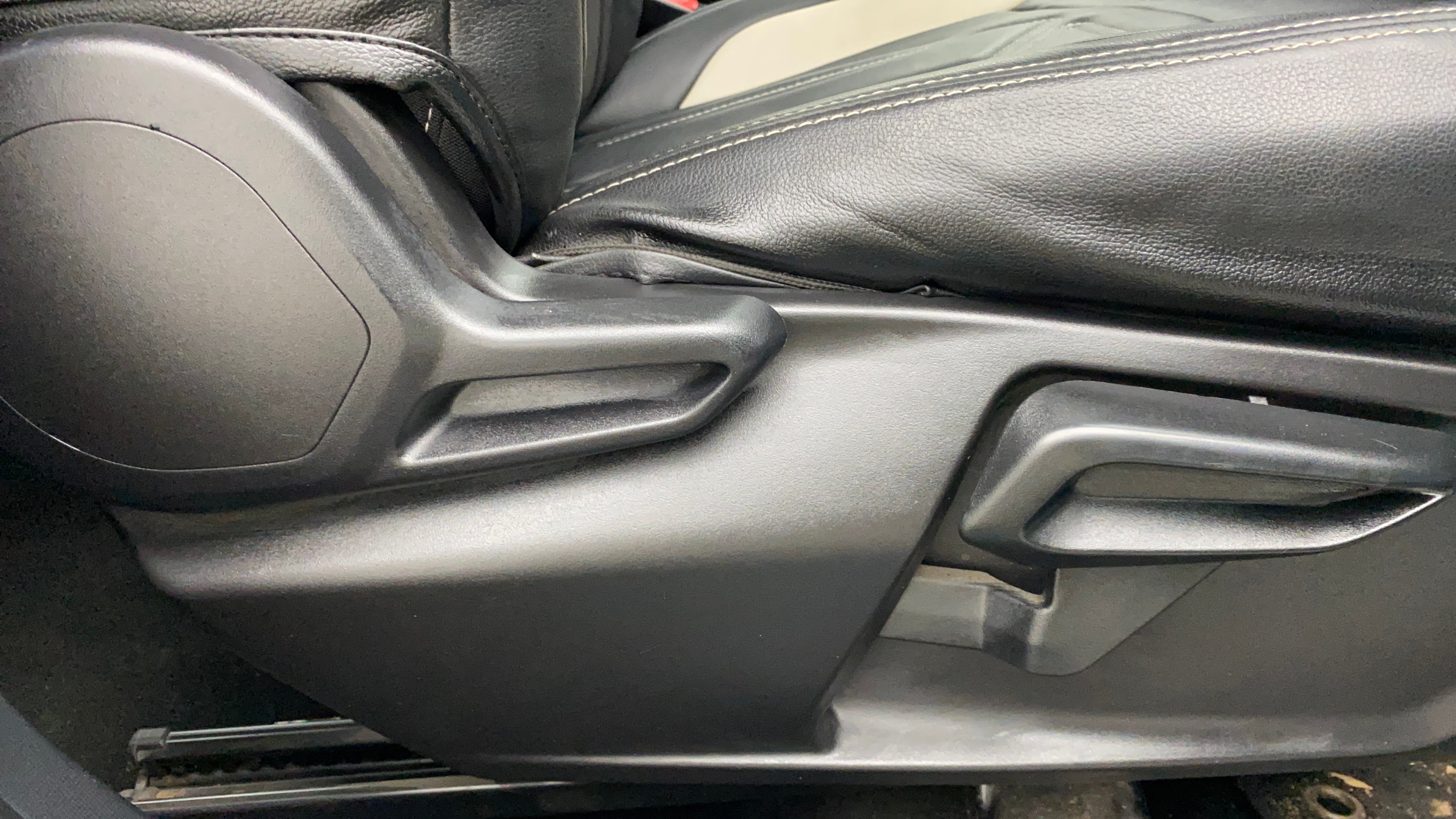 Front seat side adjustment lever of a Tata Nexon 2017-2023
