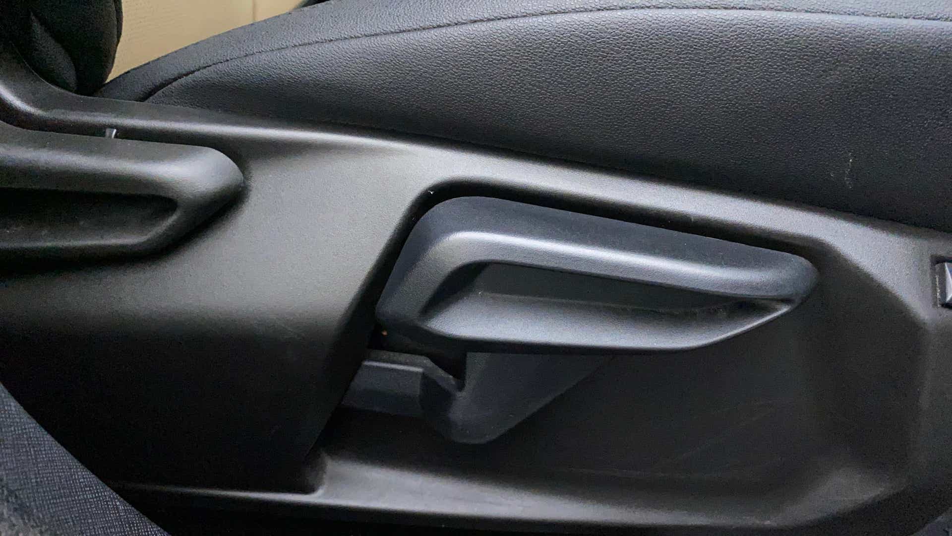 Close-up of seat adjustment lever of a Tata Nexon 2017-2023
