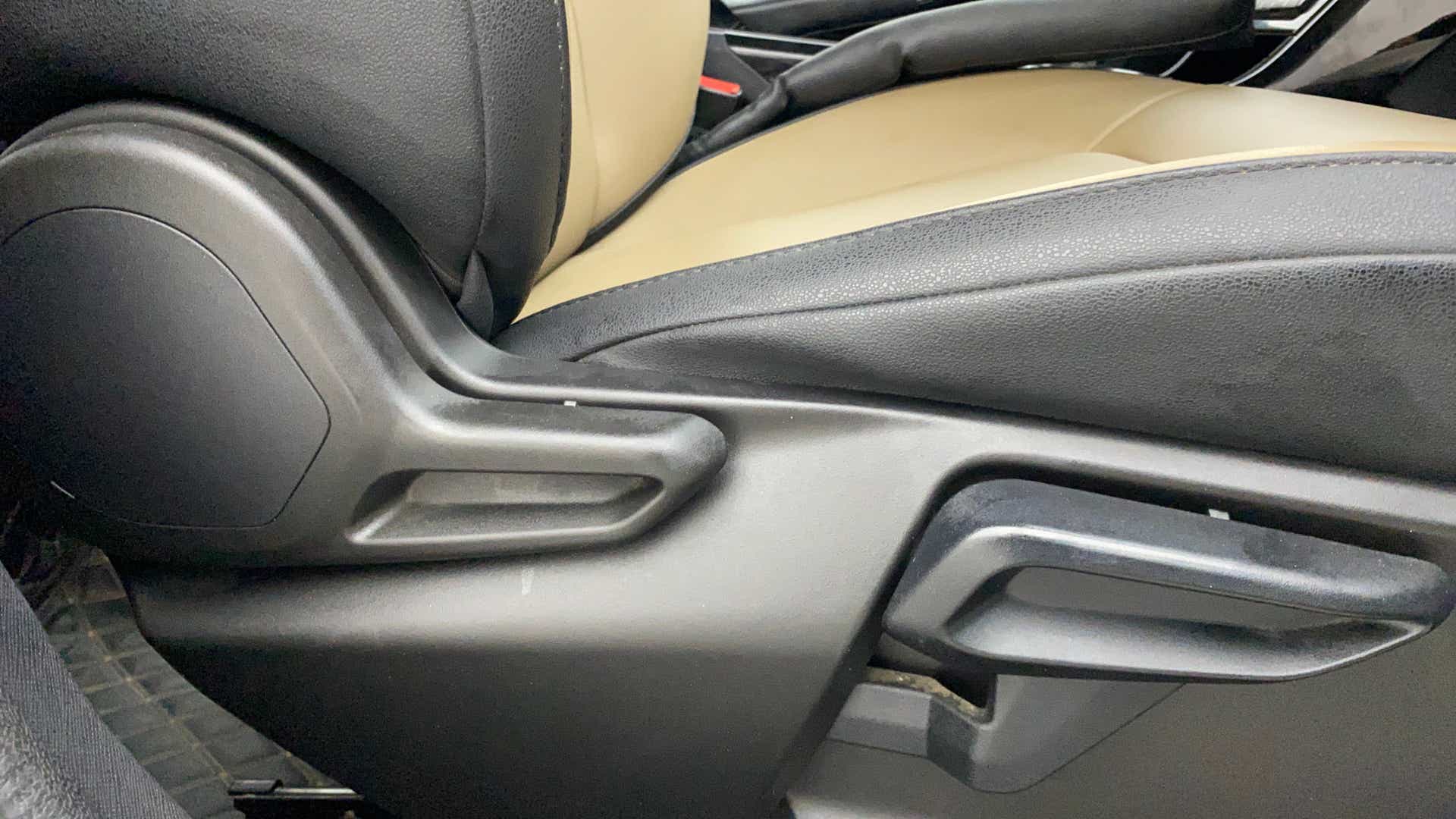 Front seat adjustment levers of a Tata Nexon 2017-2023