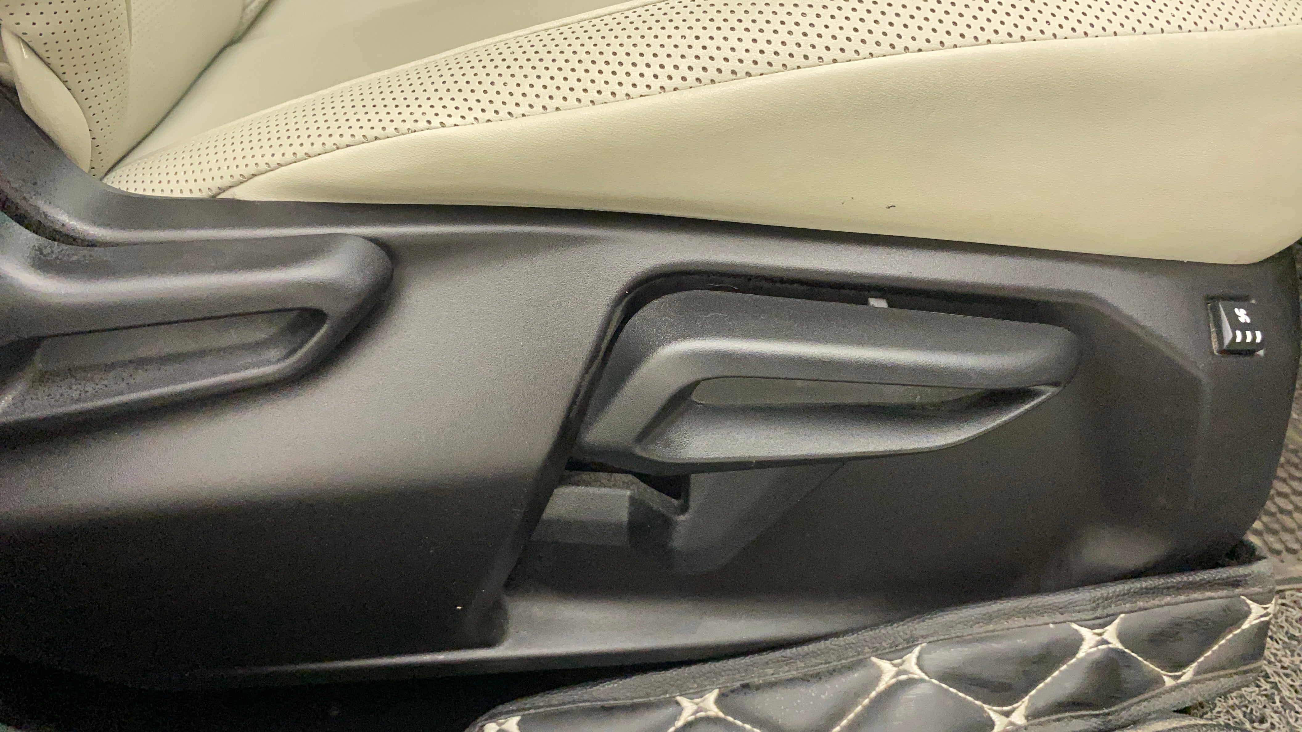 Front seat adjustment controls of a Tata Nexon 2017-2023