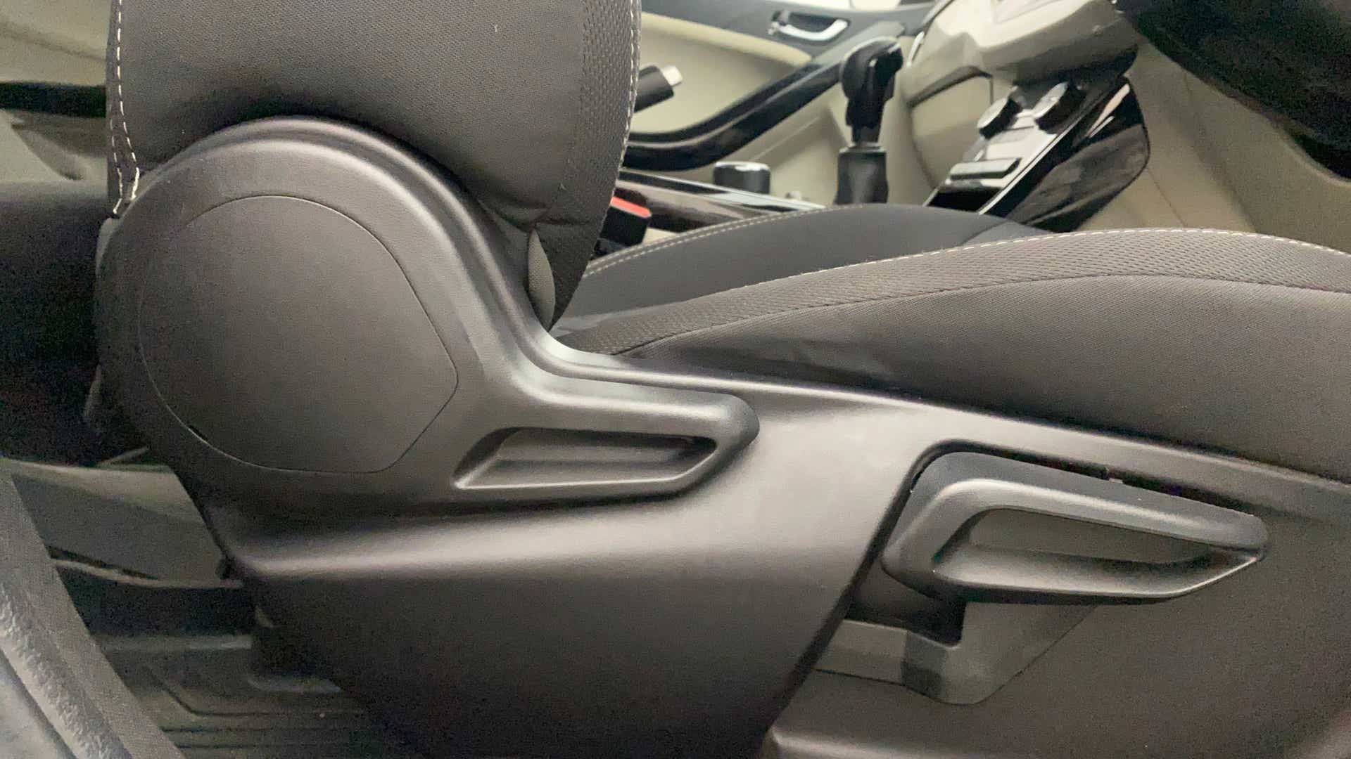 Front seat adjustment controls of a Tata Nexon 2017-2023