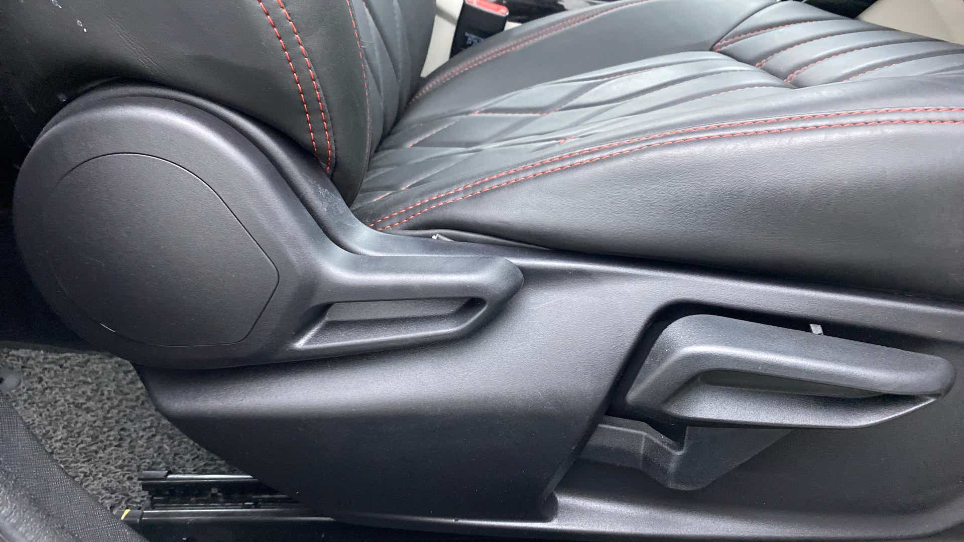 Driver seat side adjustment controls of a Tata Nexon 2017-2023