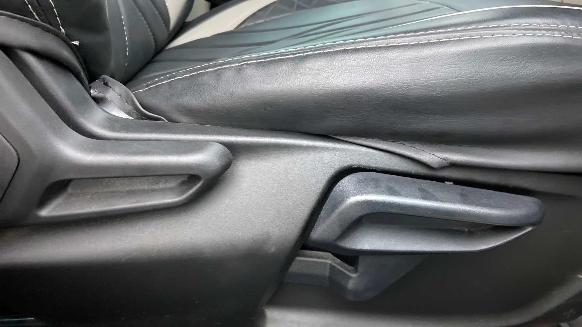 Driver seat adjustment lever of a Tata Nexon 2017-2023