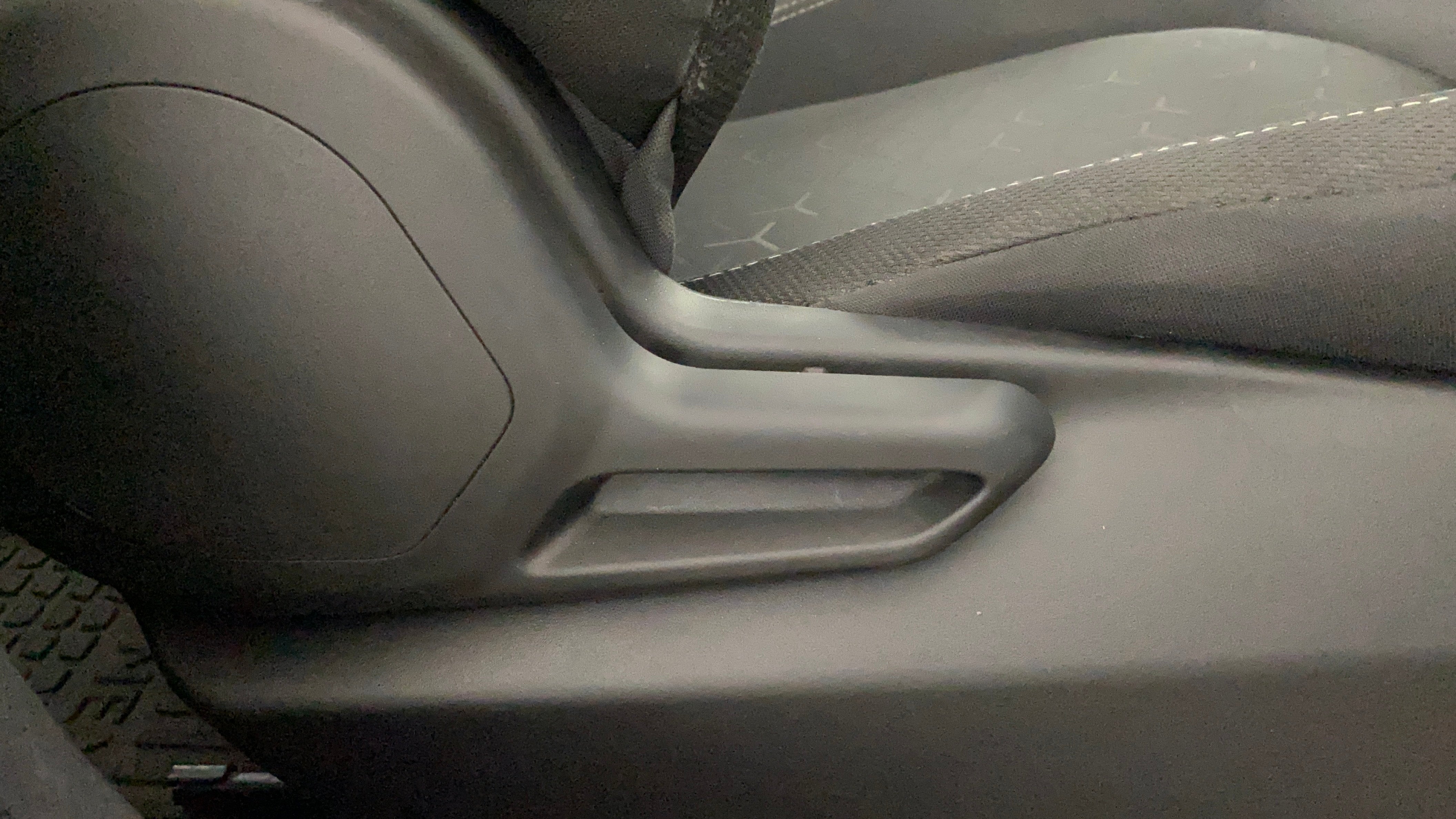 Seat height adjuster lever of a Tata Nexon 2017-2023