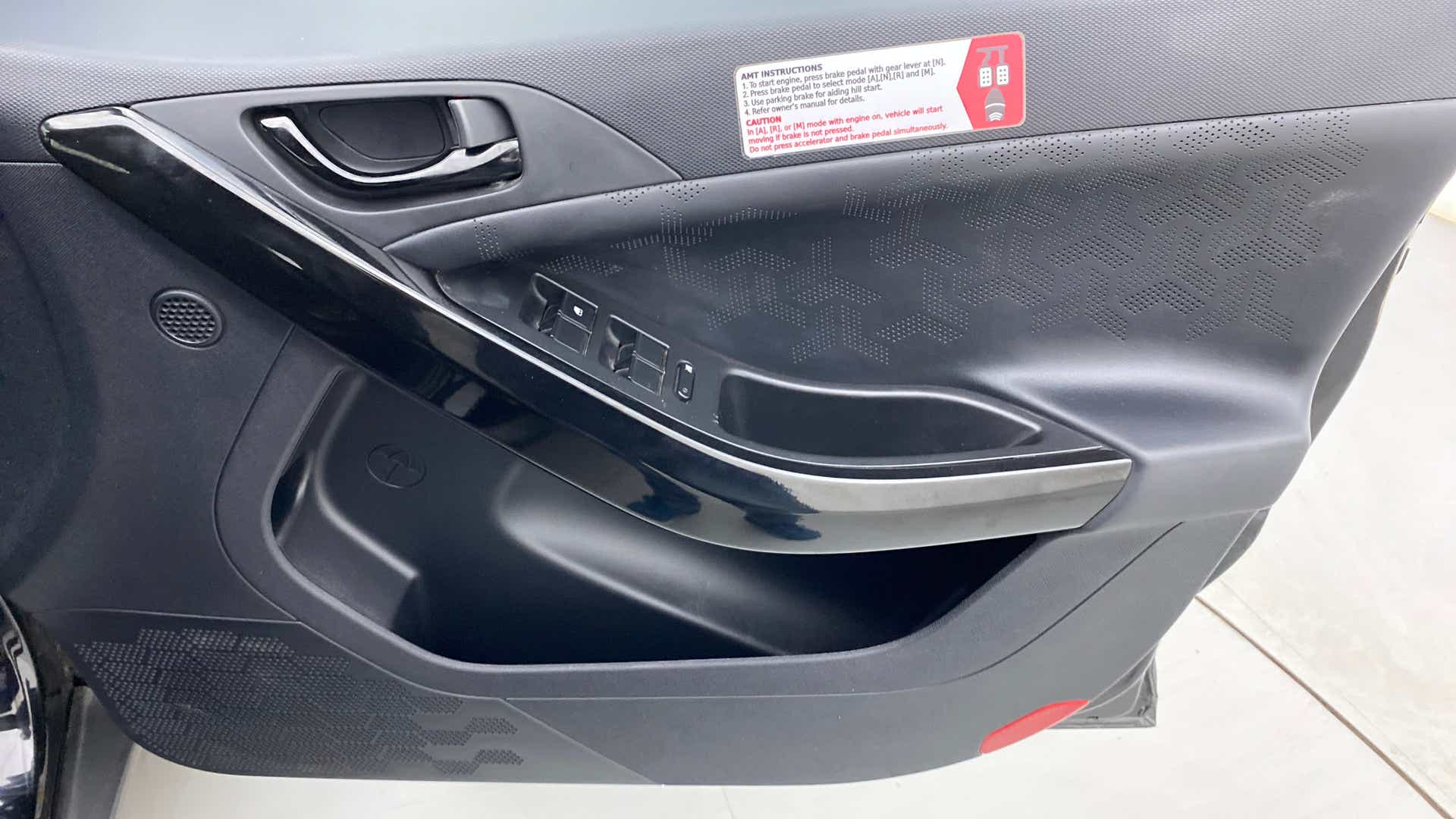 Interior front door panel of a Tata Nexon 2017-2023