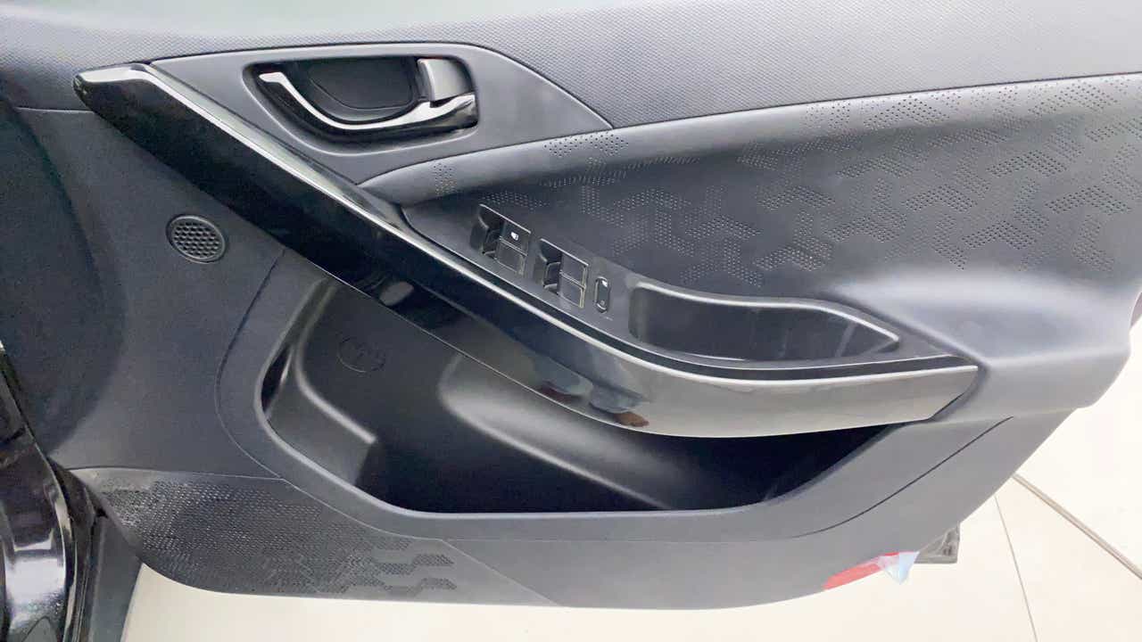 Interior front door panel of a Tata Nexon 2017-2023