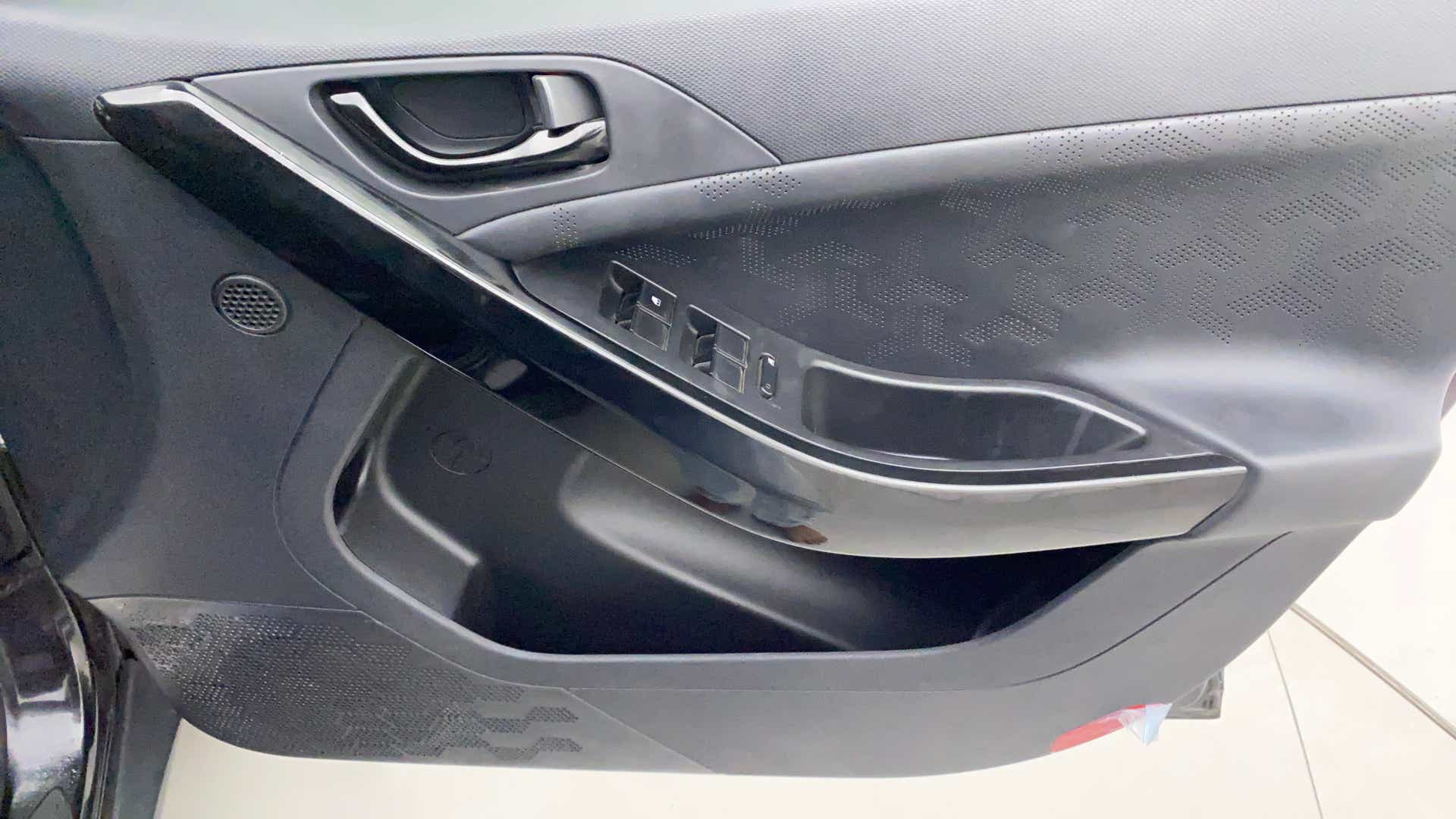 Interior front door panel of a Tata Nexon 2017-2023