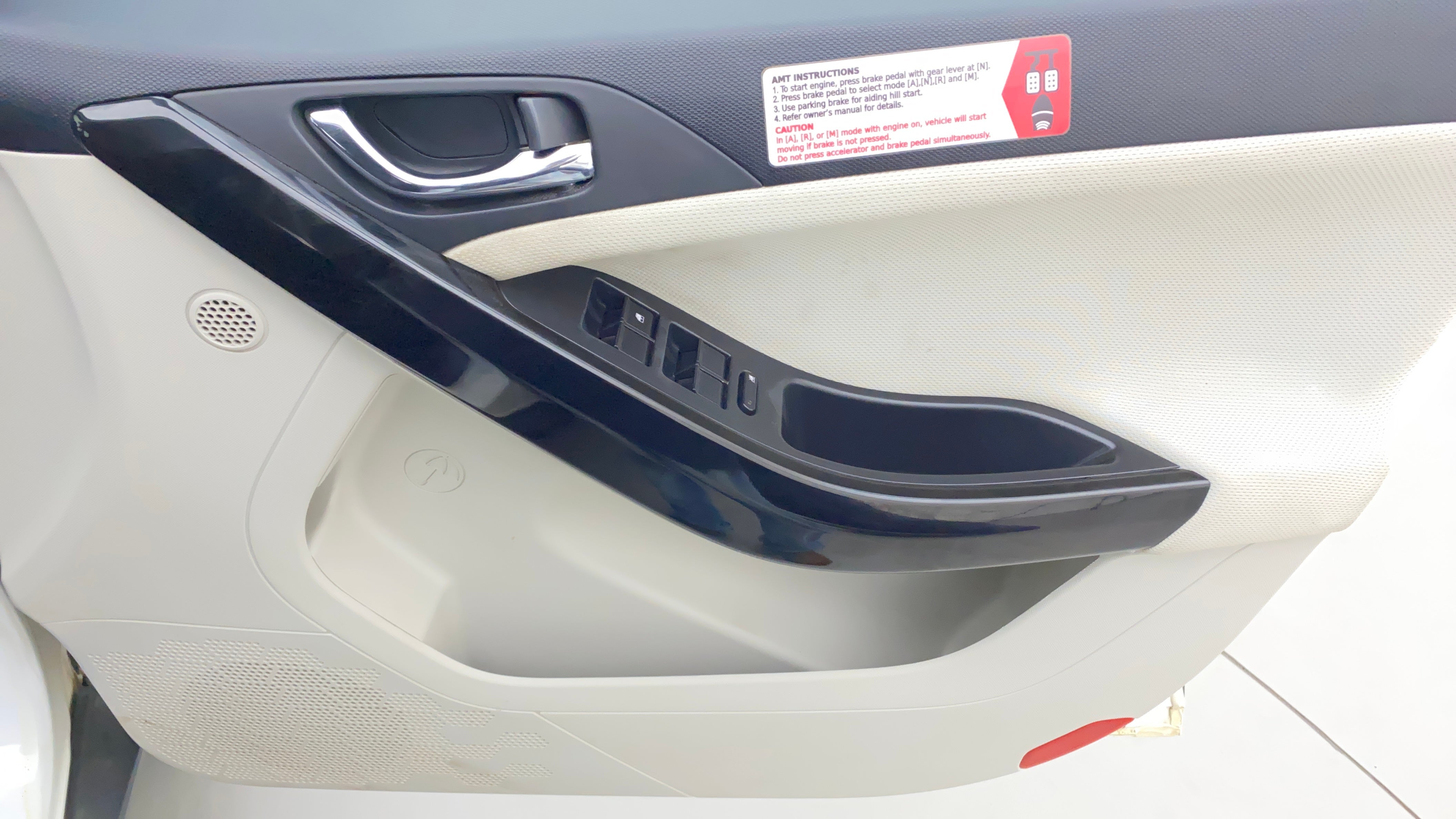 Front door interior panel of a Tata Nexon 2017-2023