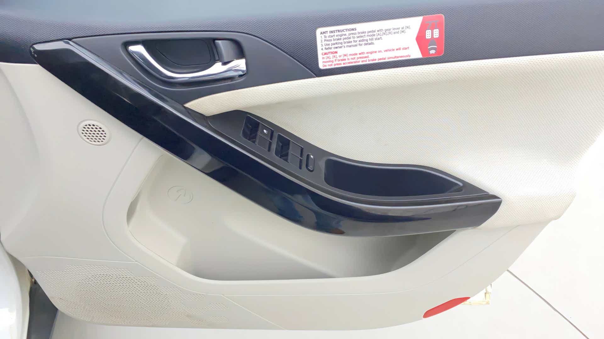 Front door interior panel of a Tata Nexon 2017-2023