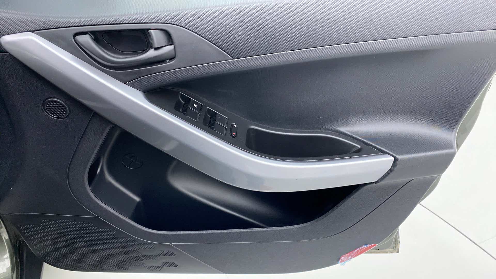Interior driver door panel of a Tata Nexon 2017-2023