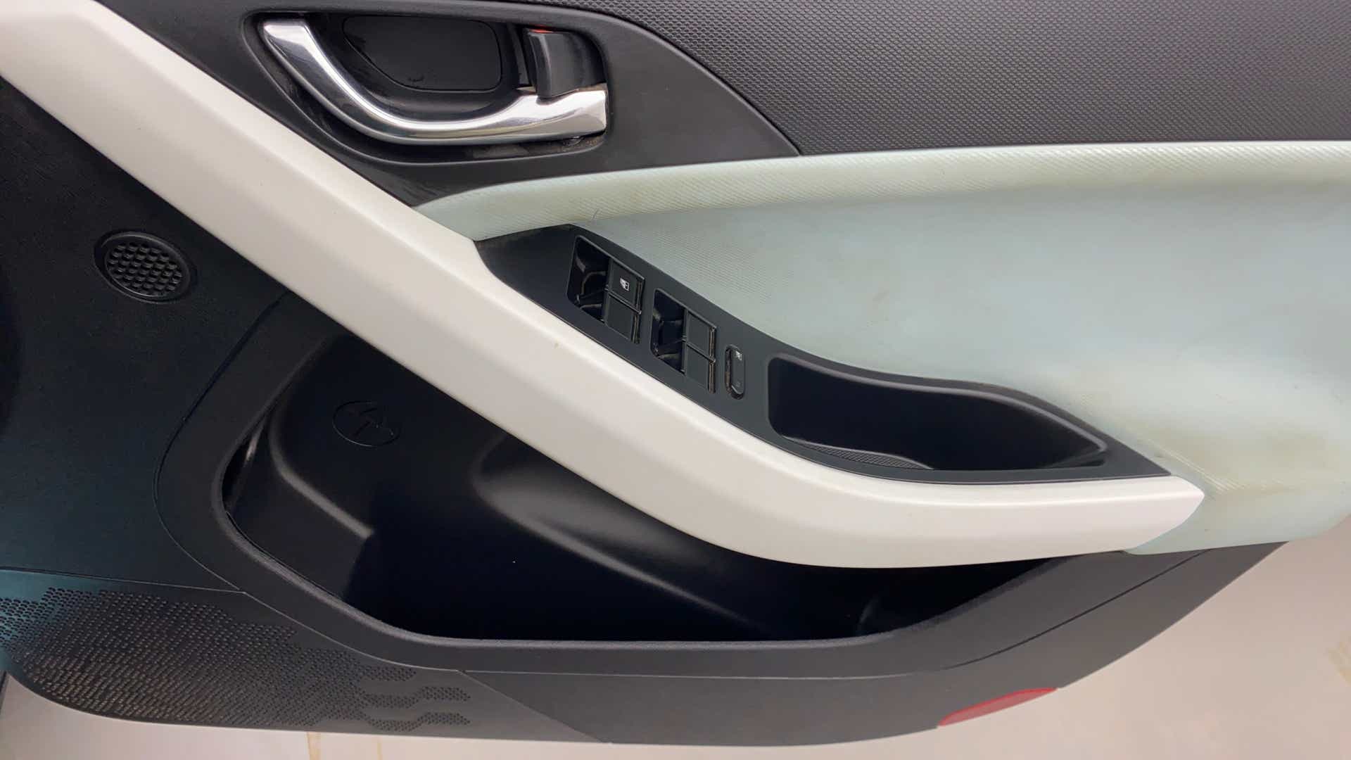 Interior door panel controls of a Tata Nexon 2017-2023