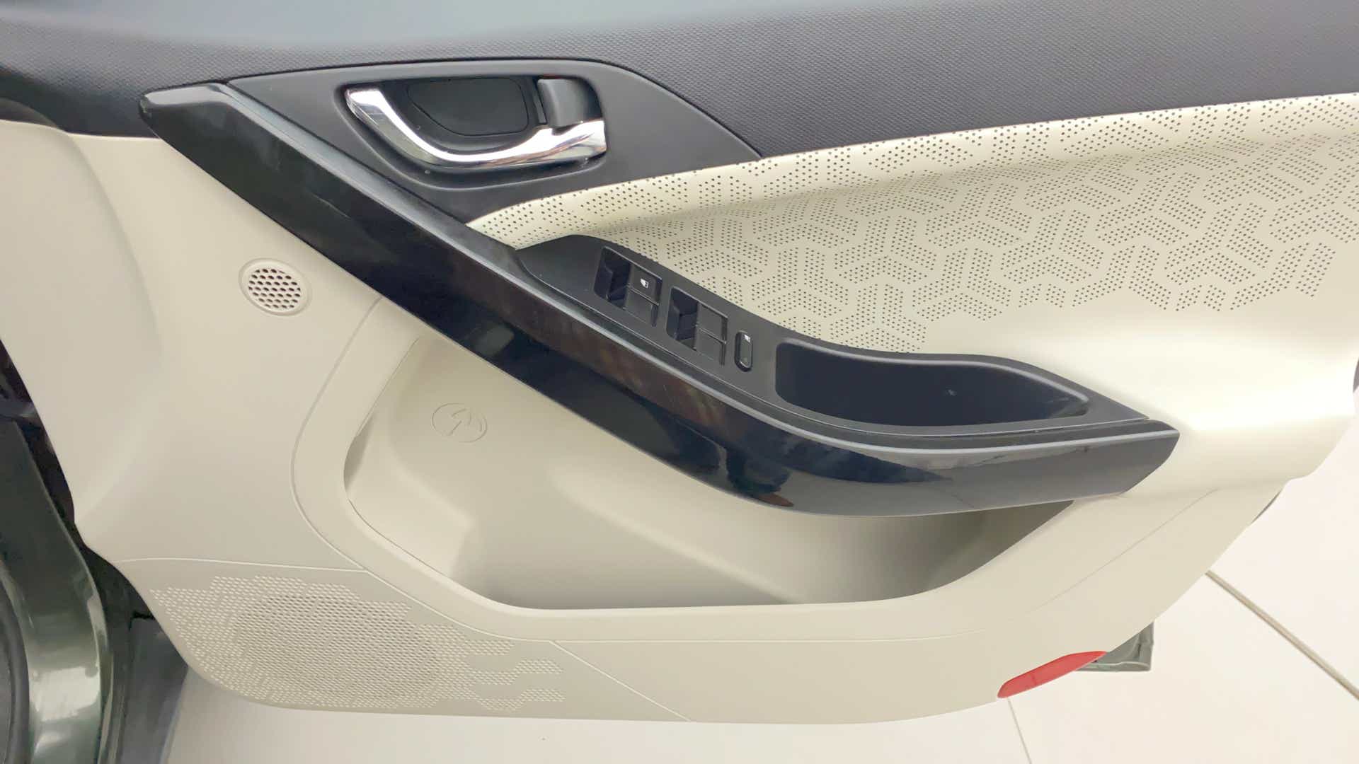 Interior driver-side door panel of a Tata Nexon 2017-2023