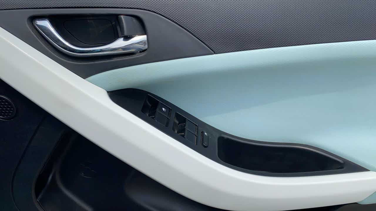 Interior door panel controls of a Tata Nexon