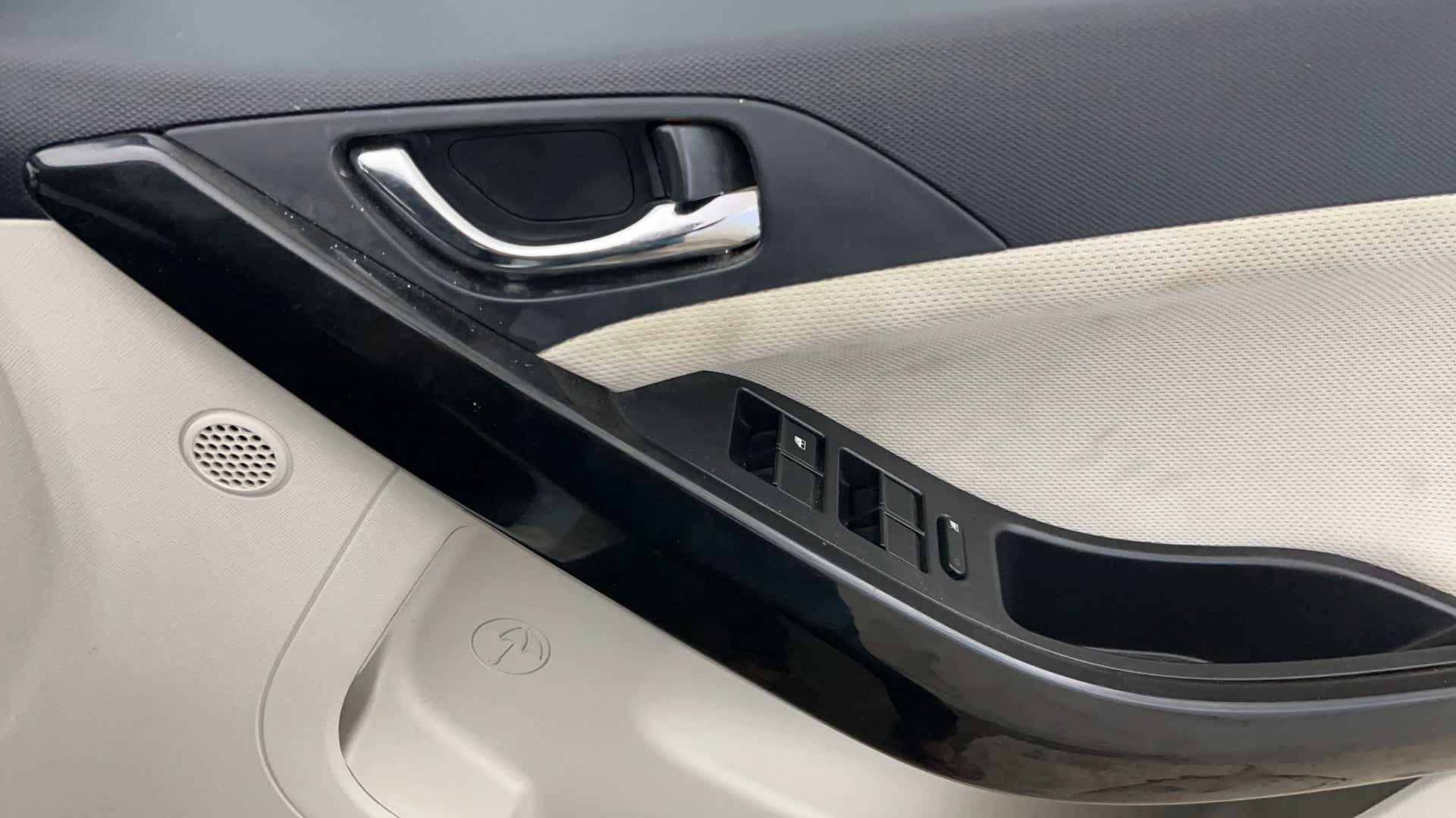Interior door handle and controls of a Tata Nexon 2017-2023