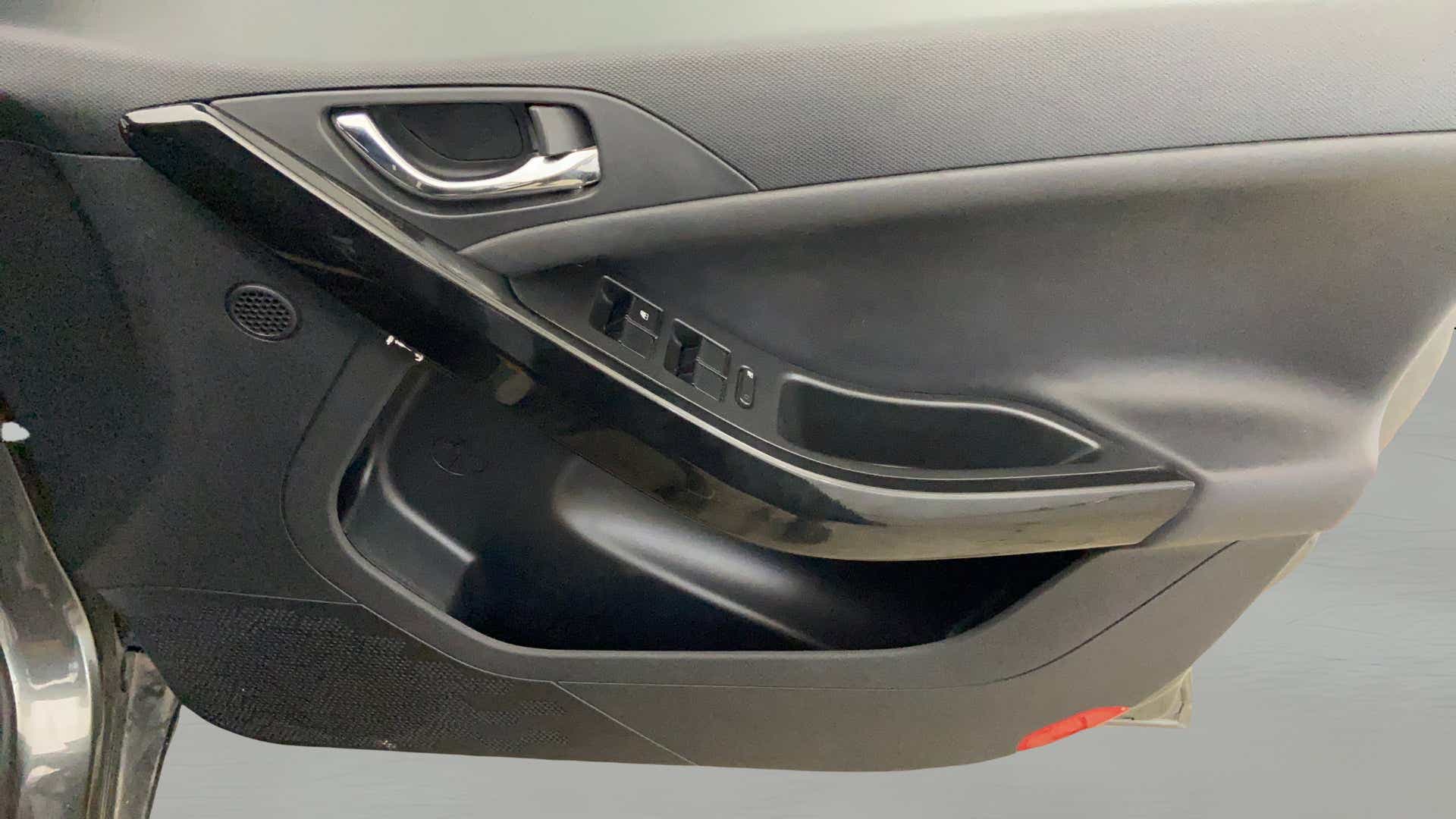 Close-up of the interior door panel of a Tata Nexon 2017-2023
