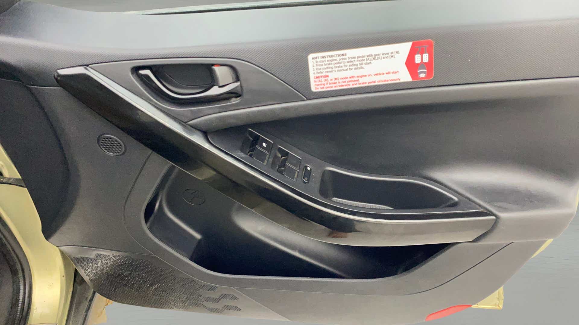 Interior front door panel of a Tata Nexon 2017-2023