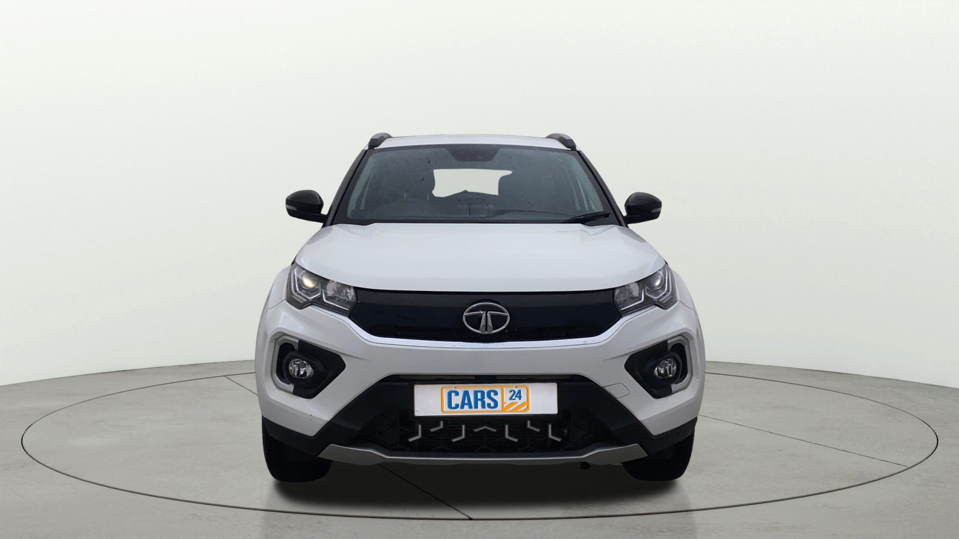 Front view of a calgary white Tata Nexon 2017-2023
