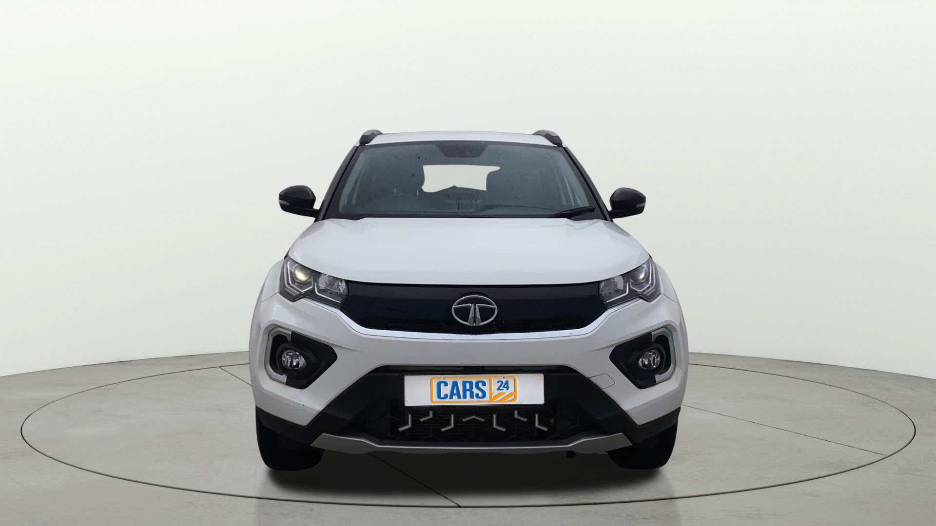Front view of a calgary white Tata Nexon 2017-2023