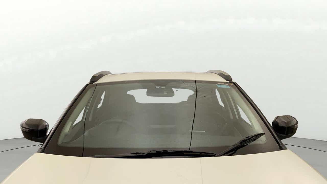 Front windshield and mirrors of a Tata Nexon