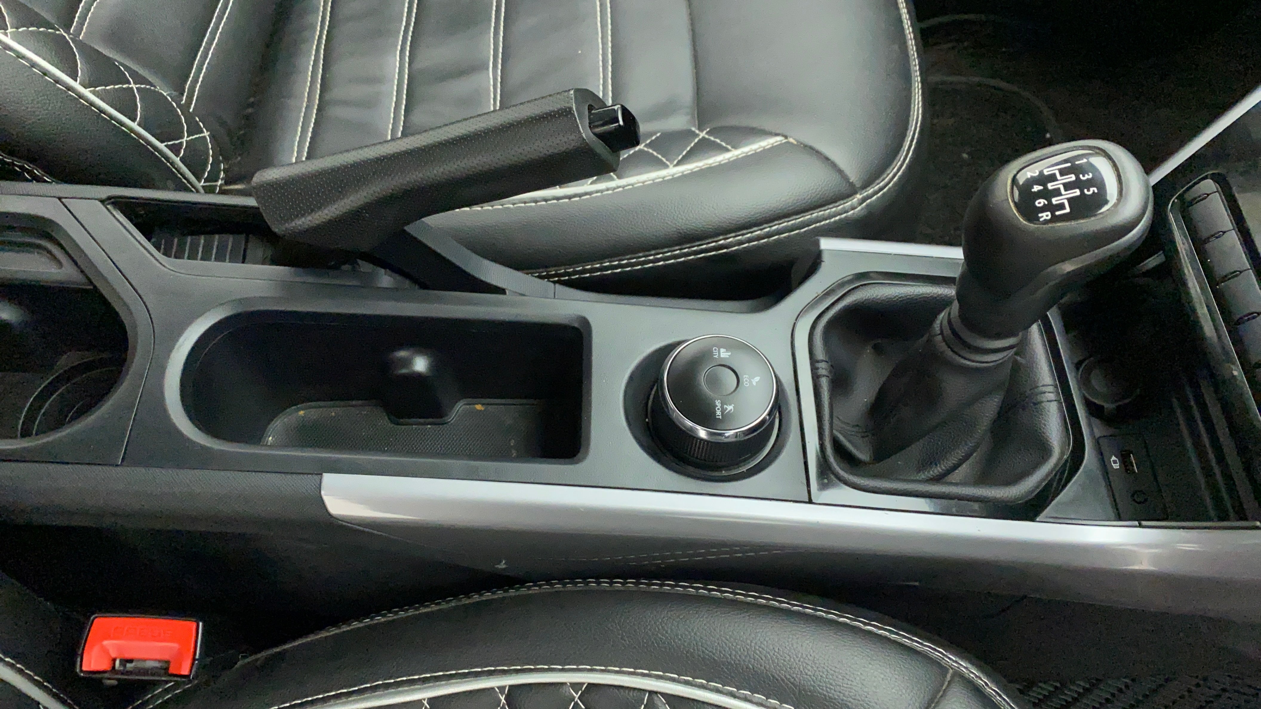 Center console with gear lever and controls of a Tata Nexon 2017-2023