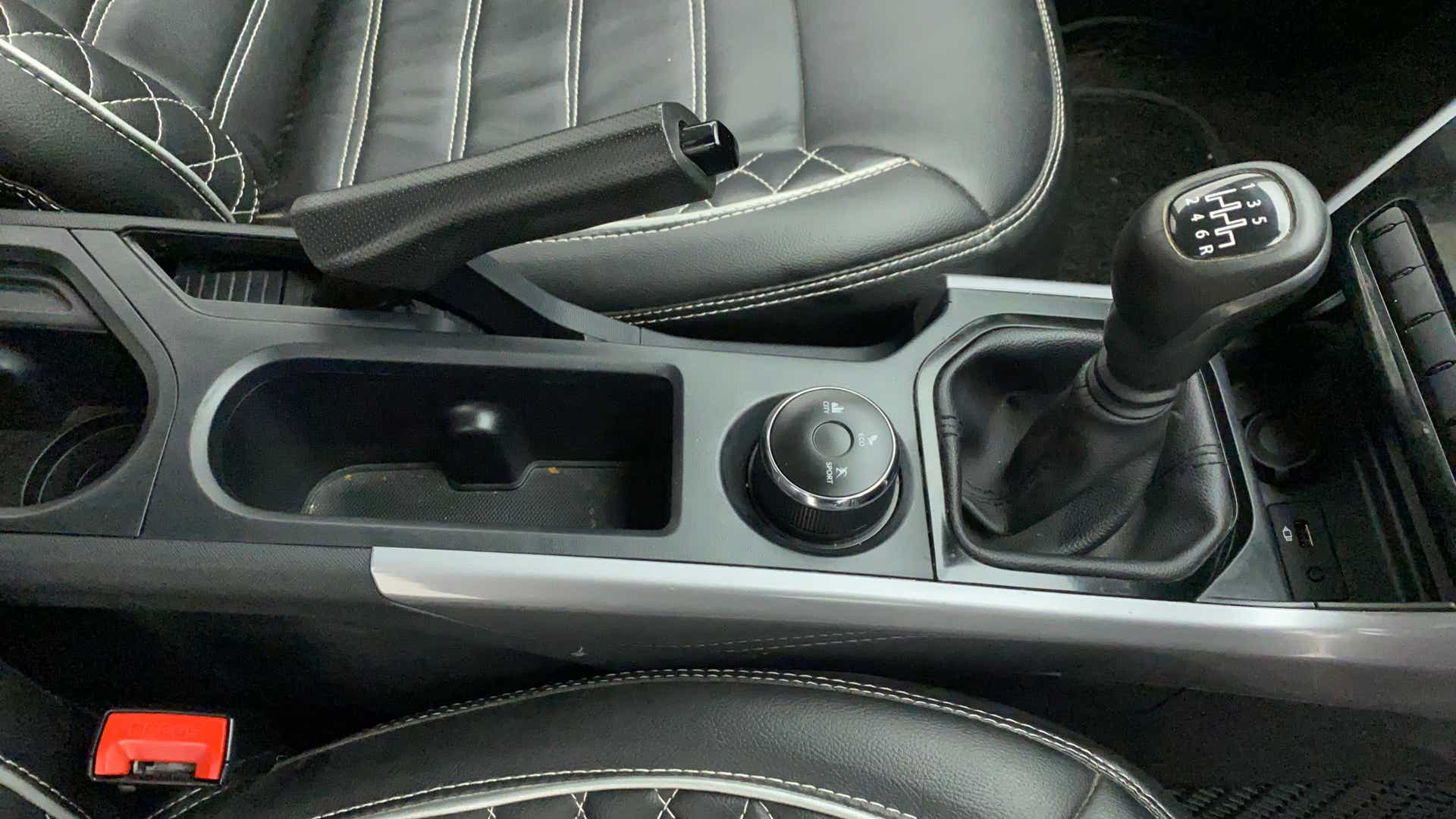 Center console with gear lever and controls of a Tata Nexon 2017-2023
