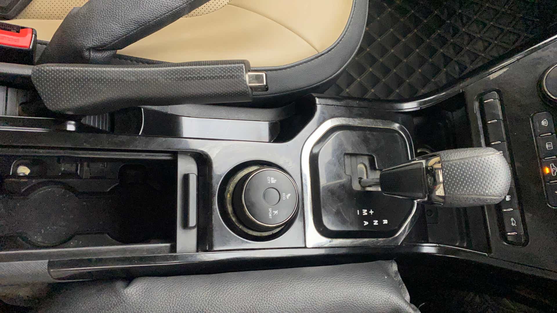Gear shifter and center console of a Tata Nexon 2017-2023