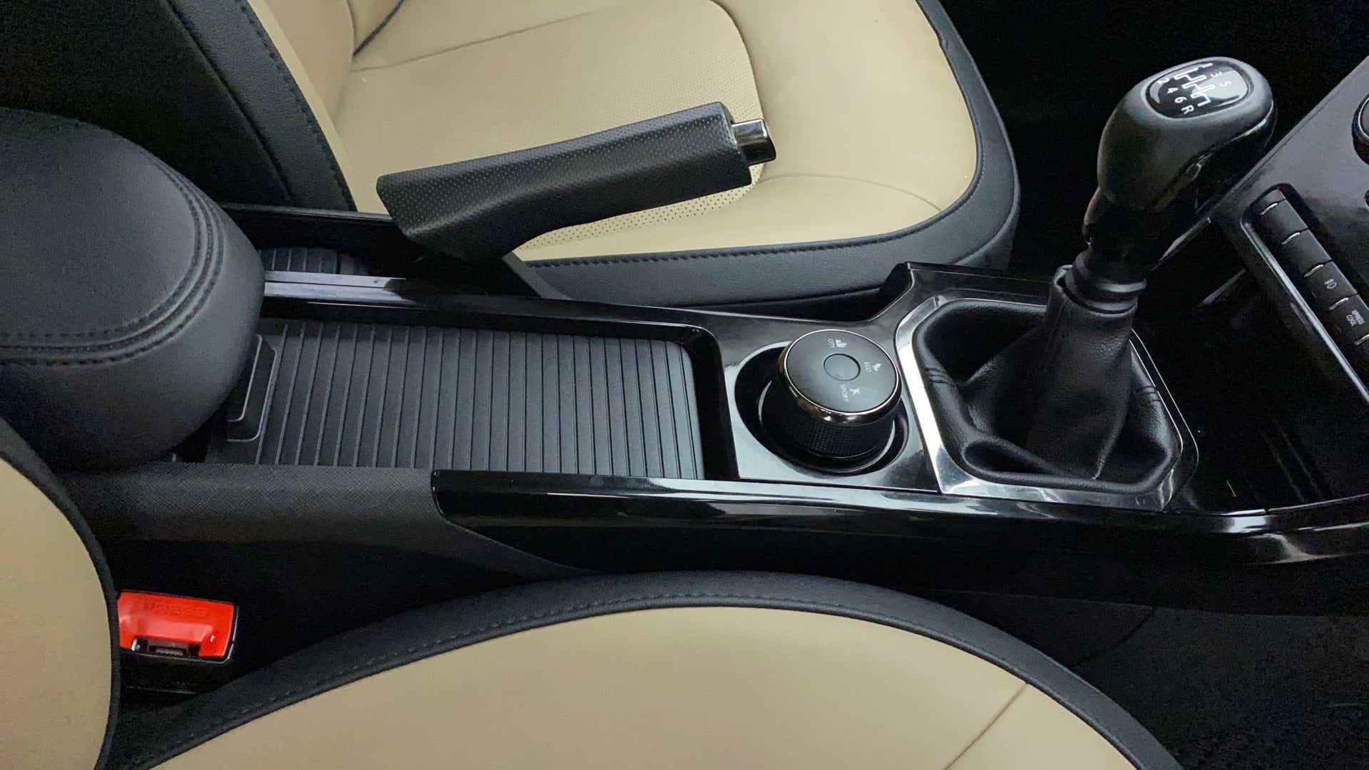 Center console with gear lever and handbrake of a Tata Nexon 2017-2023