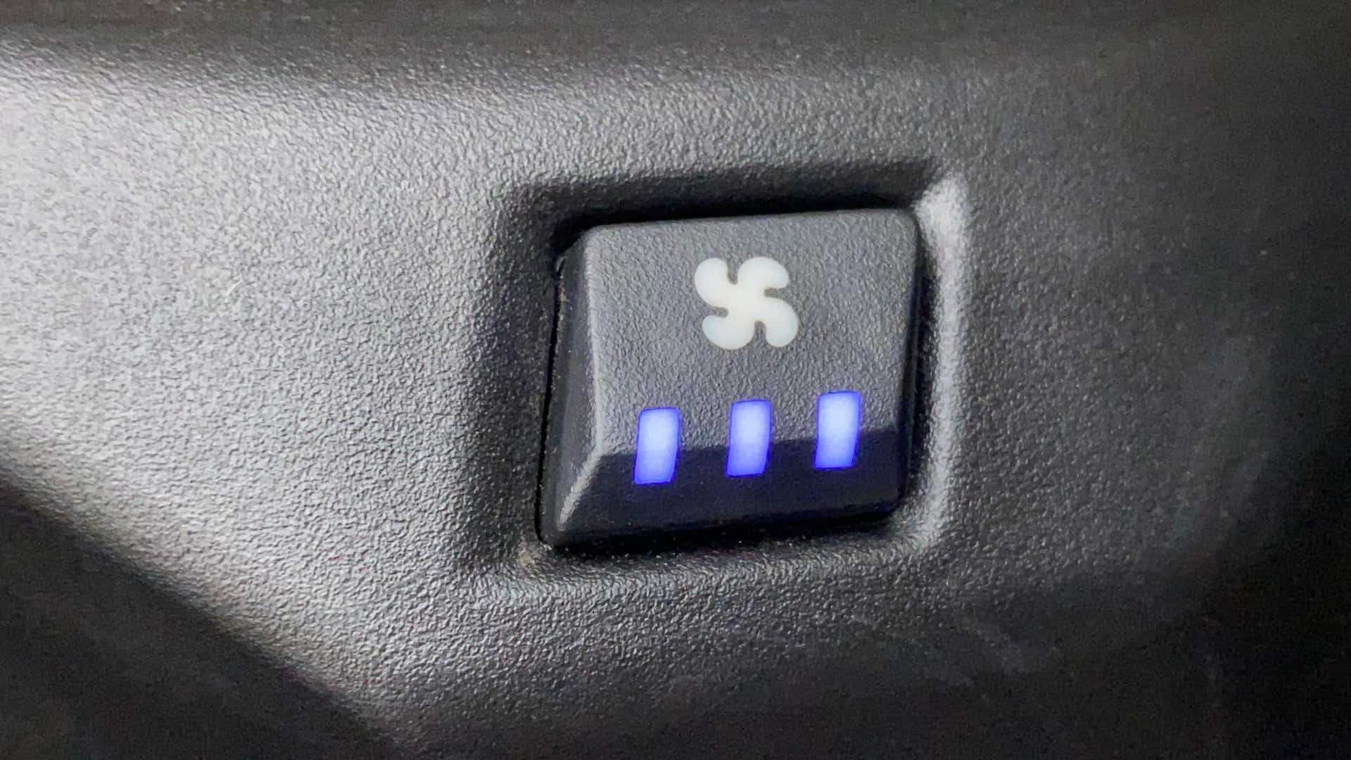 Close-up of air circulation or ventilation button in a Tata Nexon 2017-2023