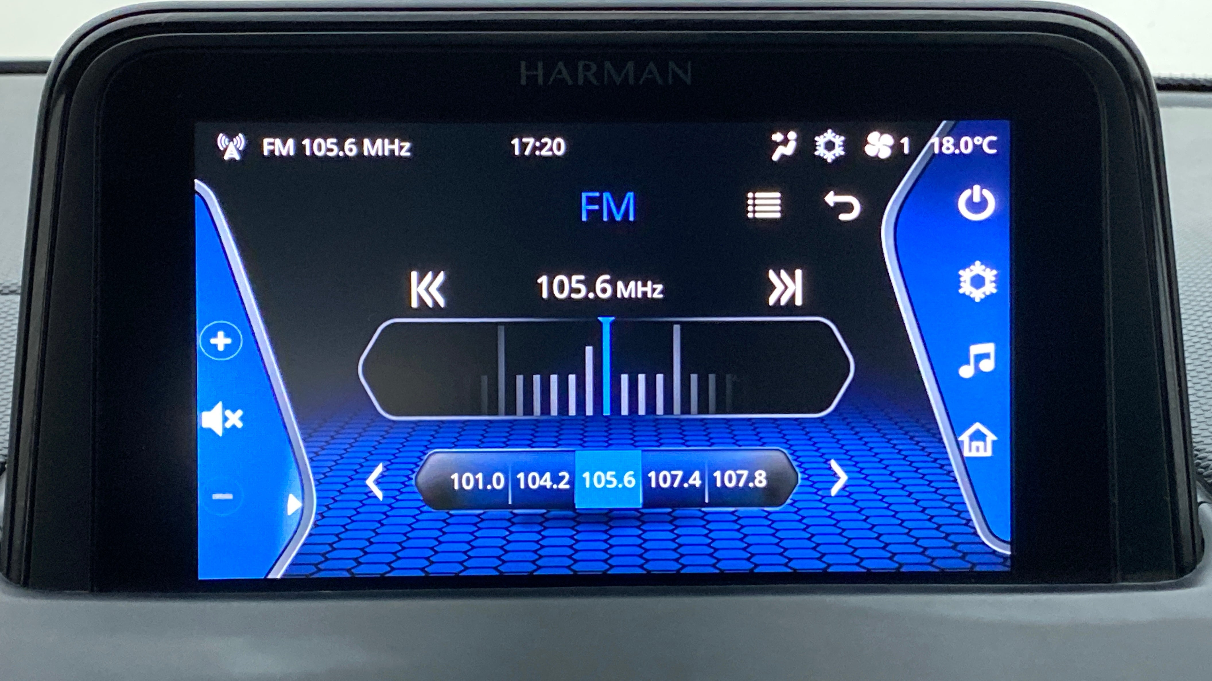Infotainment display showing FM radio of a Tata Nexon 2017-2023